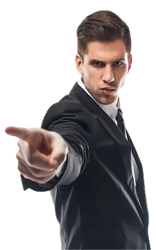 a man in a suit pointing at the camera
