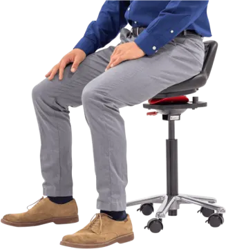 a man sitting on top of a chair