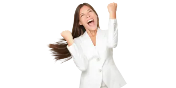 a woman in a white suit with her arms up
