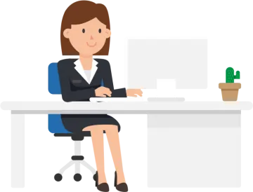 a woman sitting at a desk with her laptop