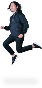 a young boy is jumping in the air