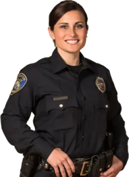 a female police officer posing for the camera