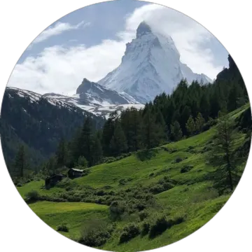 a mountain with a snow covered peak in the background