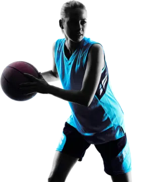 a woman holding a basketball ball in her hands