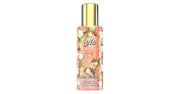 a bottle of perfume with pink flowers on it