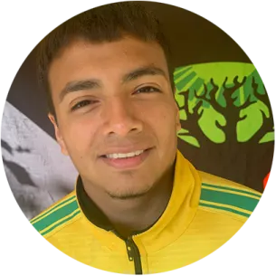 a man in a yellow and green jacket