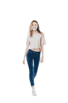 a woman in a white top and blue jeans