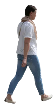 a woman walking with her back to the camera