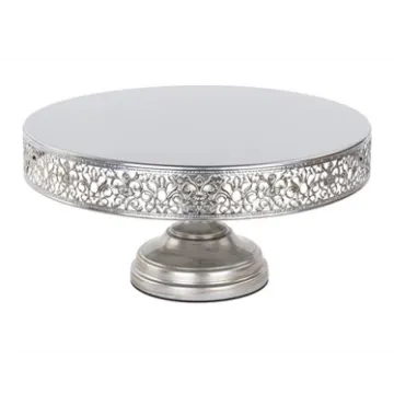 a silver cake stand on a white background
