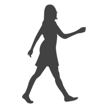 a silhouette of a woman walking