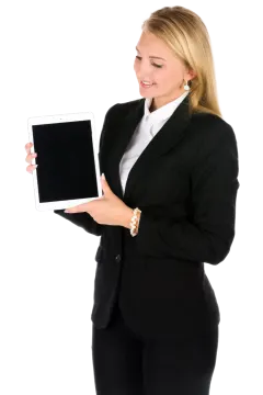 a woman in a business suit holding an ipad