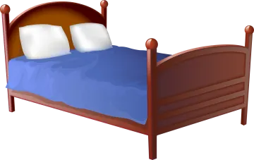 a bed with two pillows on it
