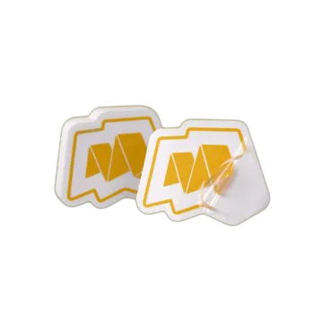 a pair of yellow and white stickers on a white background
