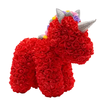 a stuffed unicorn made out of red roses