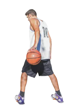a man holding a basketball ball in his hand