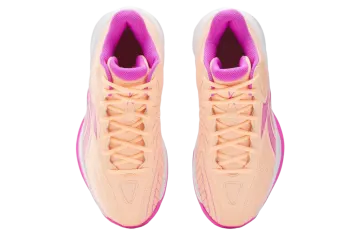 a pair of pink and white sneakers
