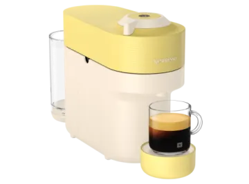 a coffee maker with a cup of coffee