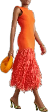 a little girl in an orange dress and yellow hat