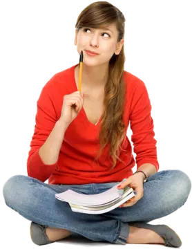 a woman sitting on the floor with a pencil in her hand