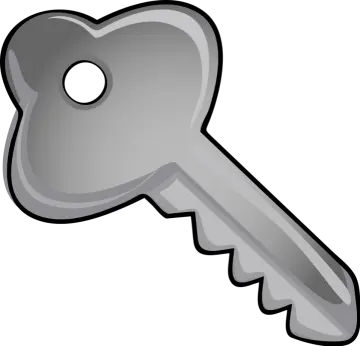 a silver key with a white background