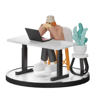 a person sitting at a desk with a laptop