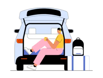 a person sitting in the back of a van