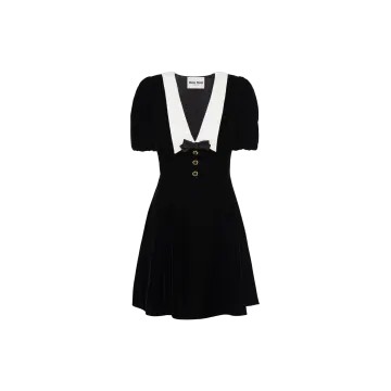 a black dress with a white collar