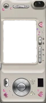 a white camera with pink flowers and hearts on it