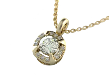 a yellow gold pendant with diamonds on it