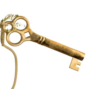 an old key with a plant growing out of it