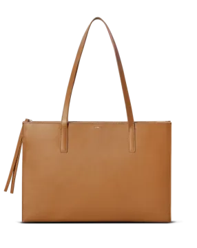a large tan leather tote bag