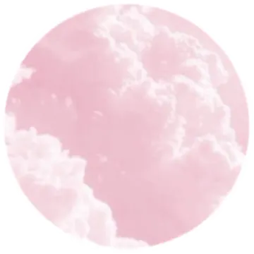 a pink moon with clouds in the background