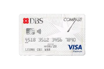 a white credit card with a red arrow on it