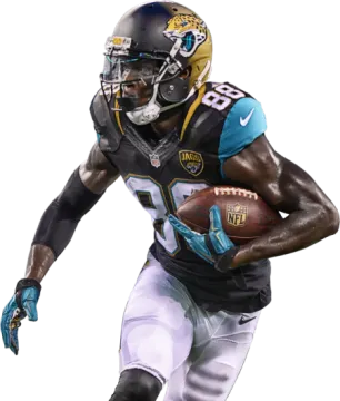 a football player is running with the ball