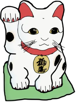 a white cat sitting on top of a green pillow