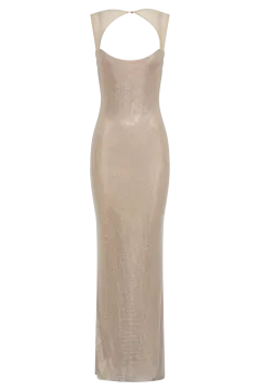 a woman in a gold dress