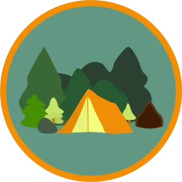 a tent with trees and mountains in the background