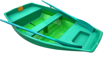 a small green boat on a white background