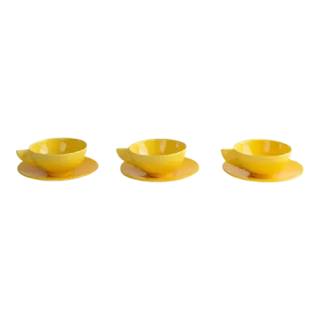 a set of three yellow dishes