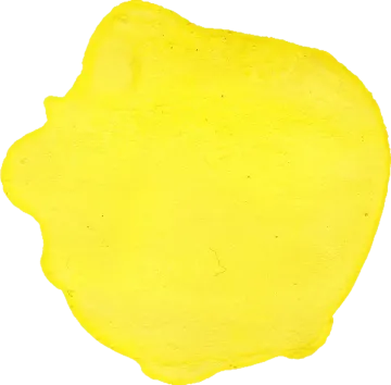 a piece of yellow clay on a white background