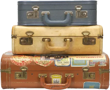 three suitcases stacked on top of each other suitcase