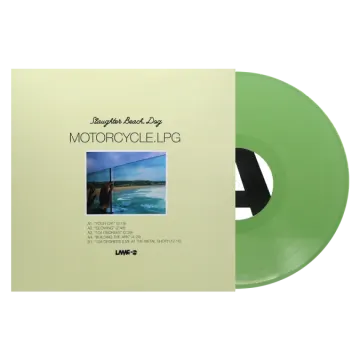 a green vinyl record with an image of a man on the beach