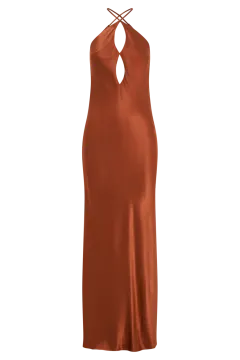 a woman is wearing an orange dress