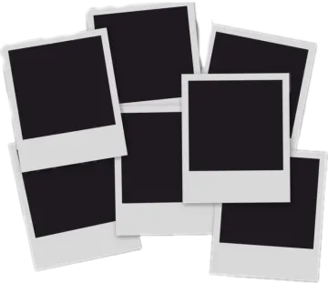 a pile of black and white polaroids