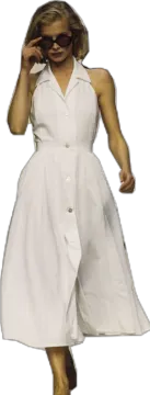 a woman wearing a white dress and sunglasses