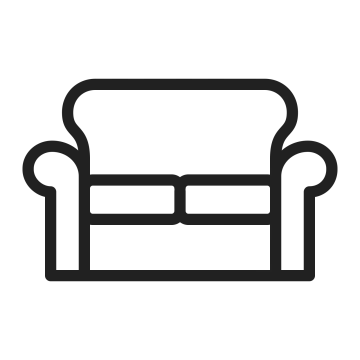 a black and white icon of a couch