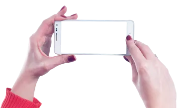 two hands holding an iphone with a white screen