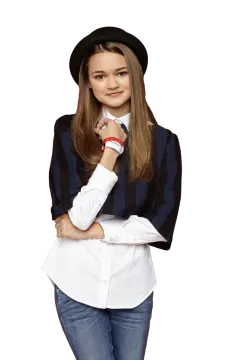 a young girl wearing a white shirt and black hat