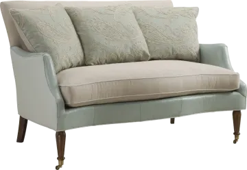 a couch with two pillows on top of it