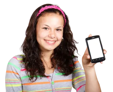 a young girl holding up a cell phone
